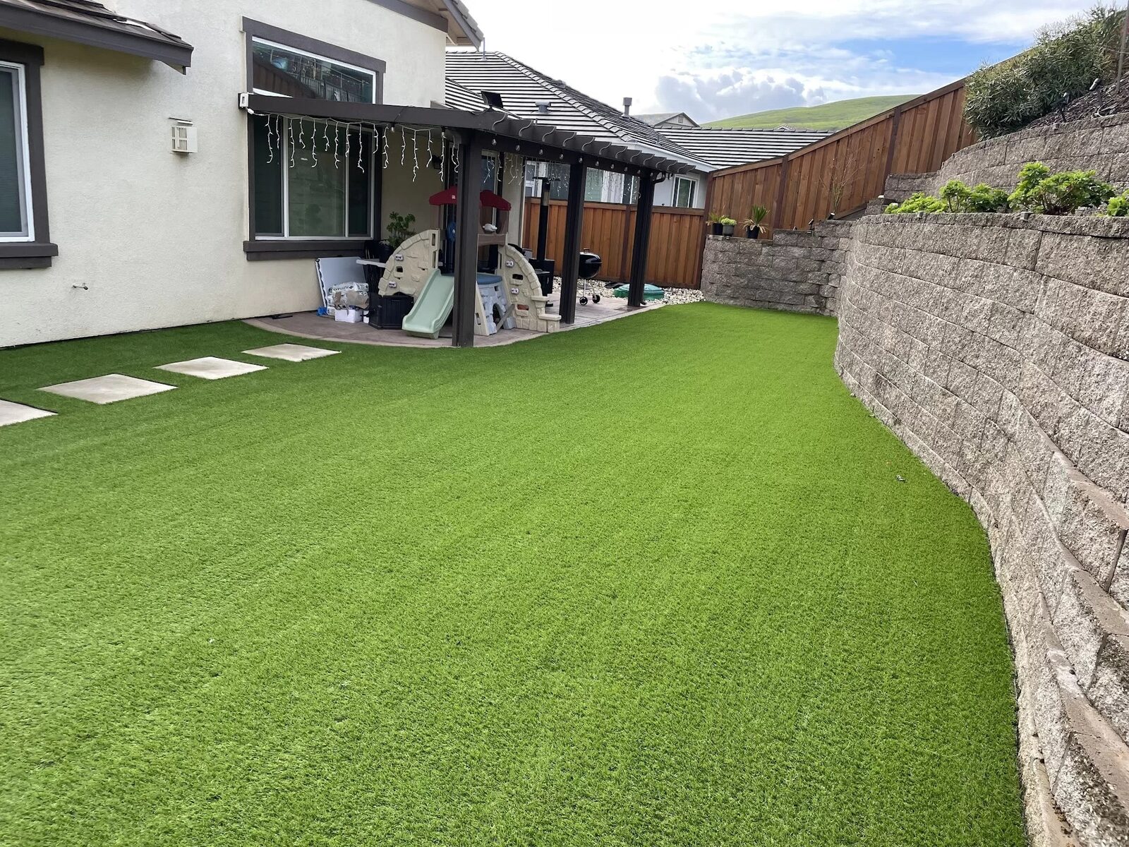 Tuscany 54 oz Backyard with Play Area — Always Green Tuscany 54 oz installed by USA Home Improvement